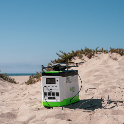 Scene Portable power station with a drone on a sandy beach